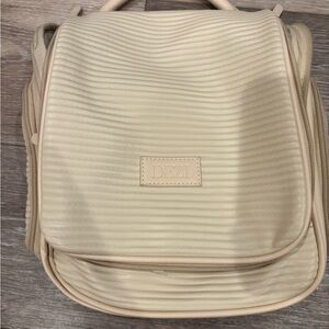 DEZI Beige Textured Women's toiletry bag